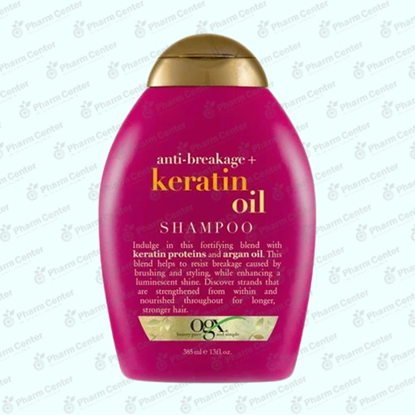OGX 7519 Шампунь  против ломкости с кератиновым маслом 385мл